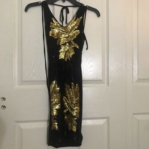 Black and yellow sequin dress